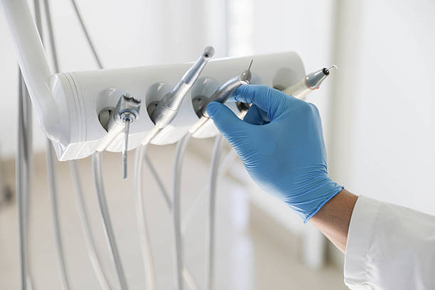 Professional Tooth Extraction technician working in Black Diamond, FL